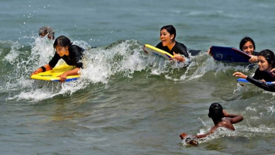 Surfing in Kovalam